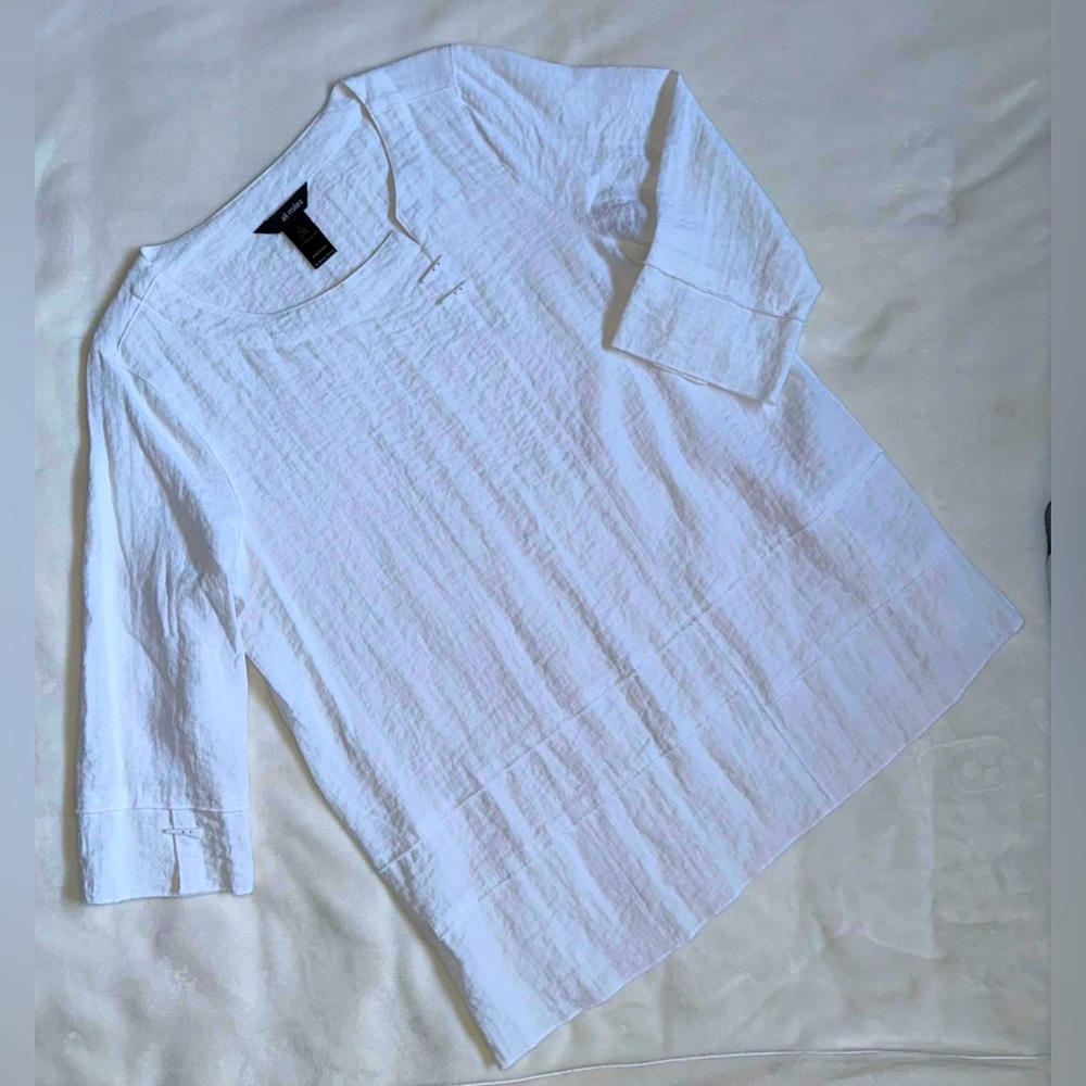 Ali Miles white tunic top
Size L, but roomy